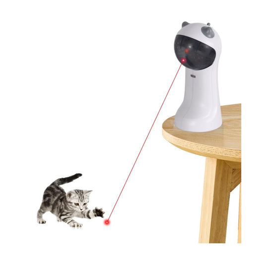 VIGOR automatic cat laser toy on a table projecting a red dot for a kitten