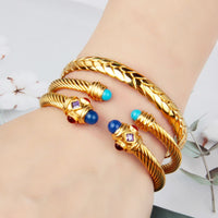 Bohemian style 18K gold braided steel wire open ended bracelet