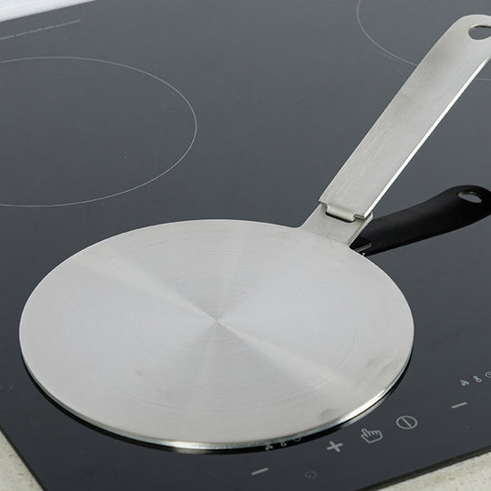 Heat diffuser plate on an induction cooktop